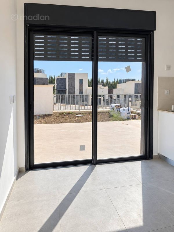 קרית בגין, מגדל העמק