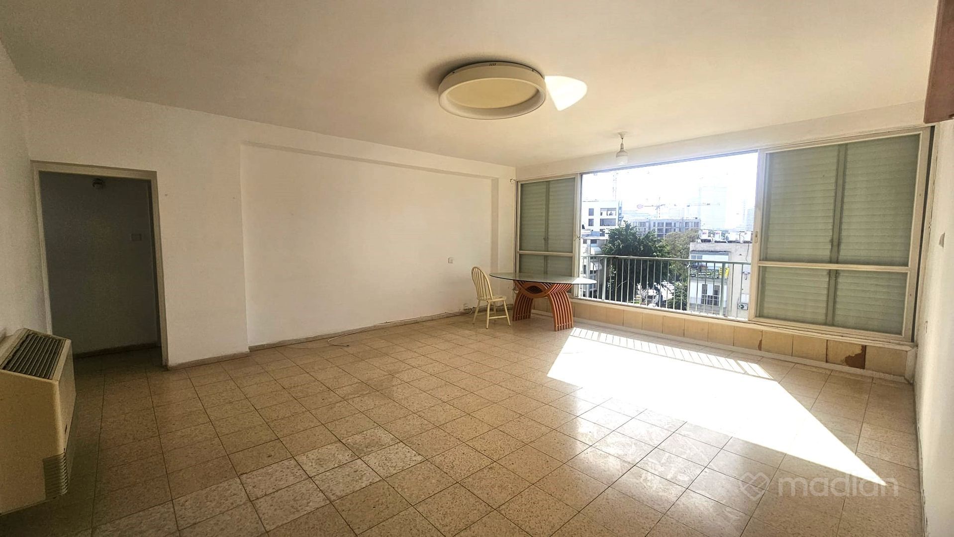 ז'בוטינסקי 102, הצפון החדש סביבת כיכר המדינה